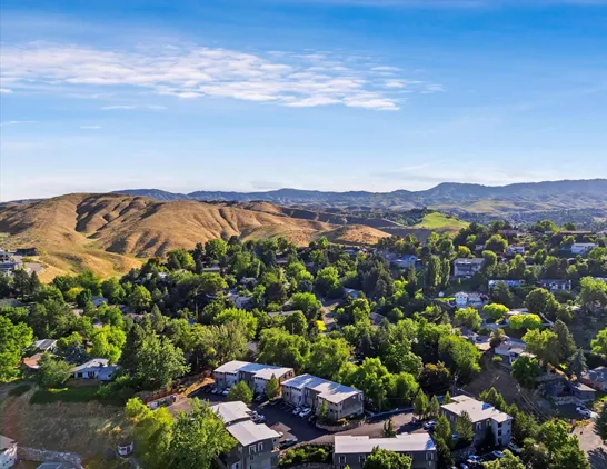 Lancaster Apartments nestled and the Boise Foothills